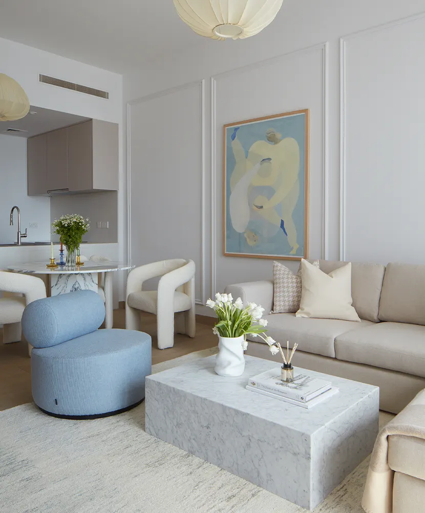 Spring Project: light apartment interior in cream, blue, and pastel tones with marble dining table, Dubai