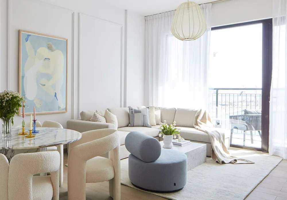 Spring Project: light apartment interior in cream, blue, and pastel tones with marble dining table, Dubai